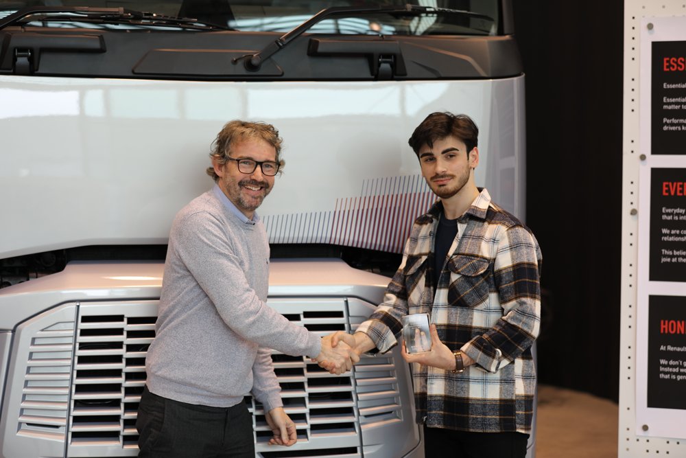 Receiving the award from Paul Daintree, Design Director of Renault Trucks, in Lyon